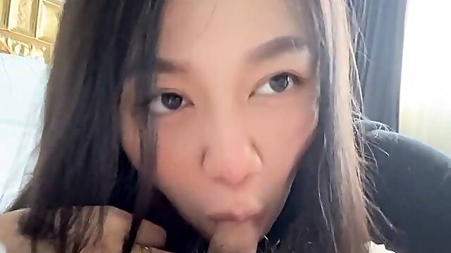 Asian Amateur Babe Gives a Knee-high Footjob