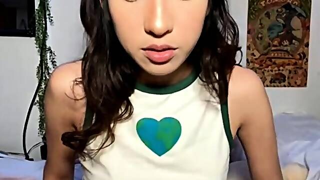 Hot japanese teen rides a big dildo in solo video