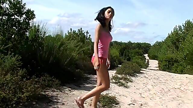 Asian girl shows her perfect ass while sunbathing