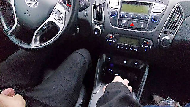 Amateur MILF gives a handjob to a taxi driver and teases him in the car, in public