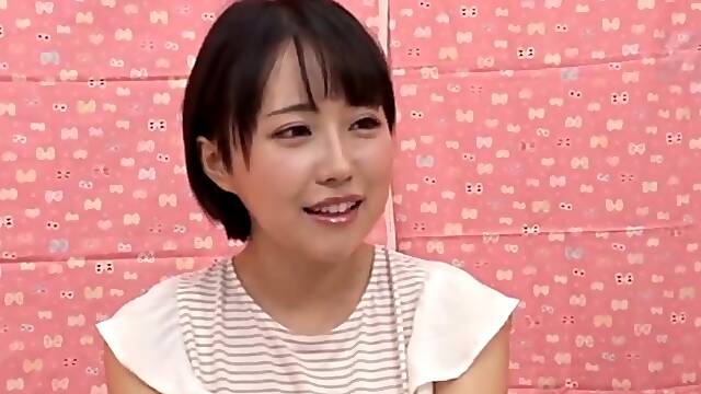 Asian cutie takes off her shirt and lets a guy play with her tits